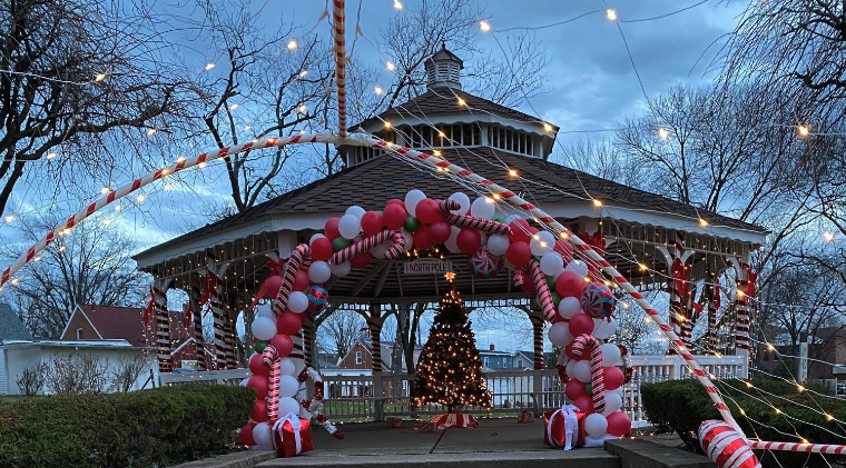 pavilion decorated with christmas candy cane decorations 