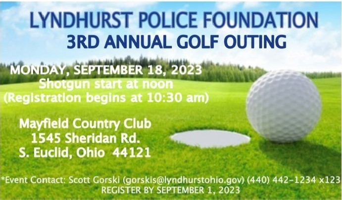 green turf with golf ball and info for annual golf outing
